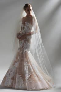 Woman wearing a Watters wedding dress